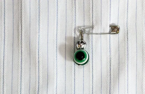 Blog Image - Hidden On Clothing To Ward Off Evil