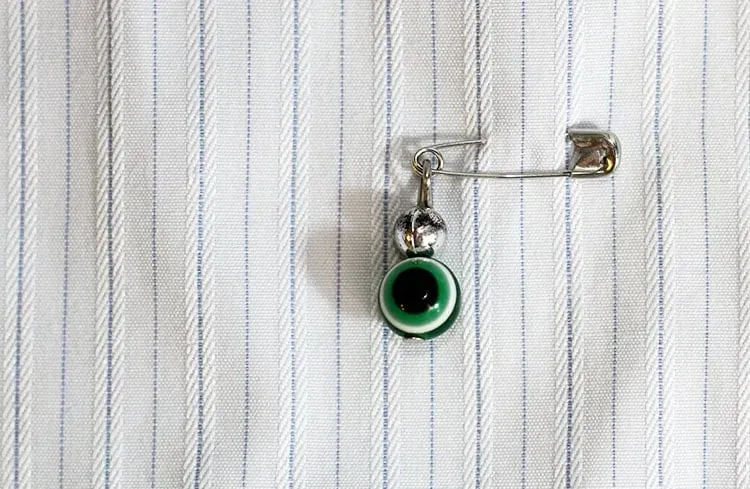 Blog Image - Hidden On Clothing To Ward Off Evil